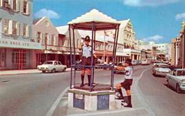 Hamilton. Policeman directs traffic from bird cage, 1959