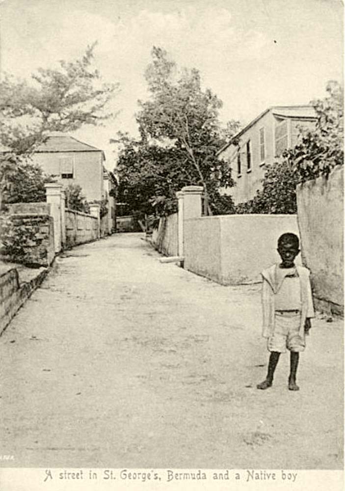 St. George's. Panorama of town street with Native boy