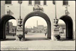 Bolton. View through the central arches of Le Mans Crescent (Civic Centre)
