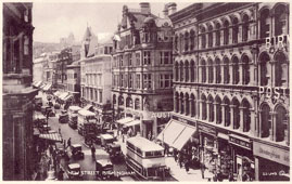 Birmingham. New Street - Shops, double-deckers buses and cars